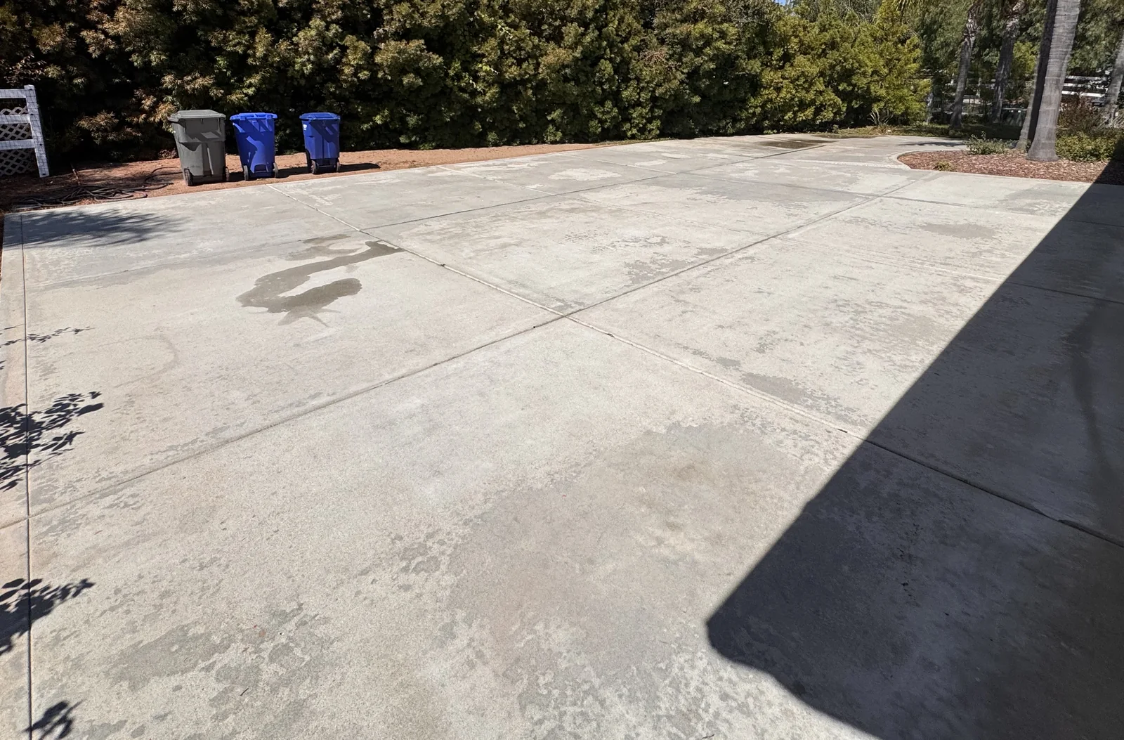 Broad concrete driveway surface in an owner-supplied Forever Clear project photo