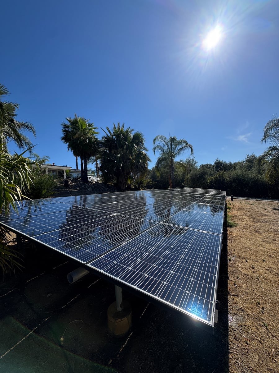 Ground mounted solar panel cleaning and maintenance service