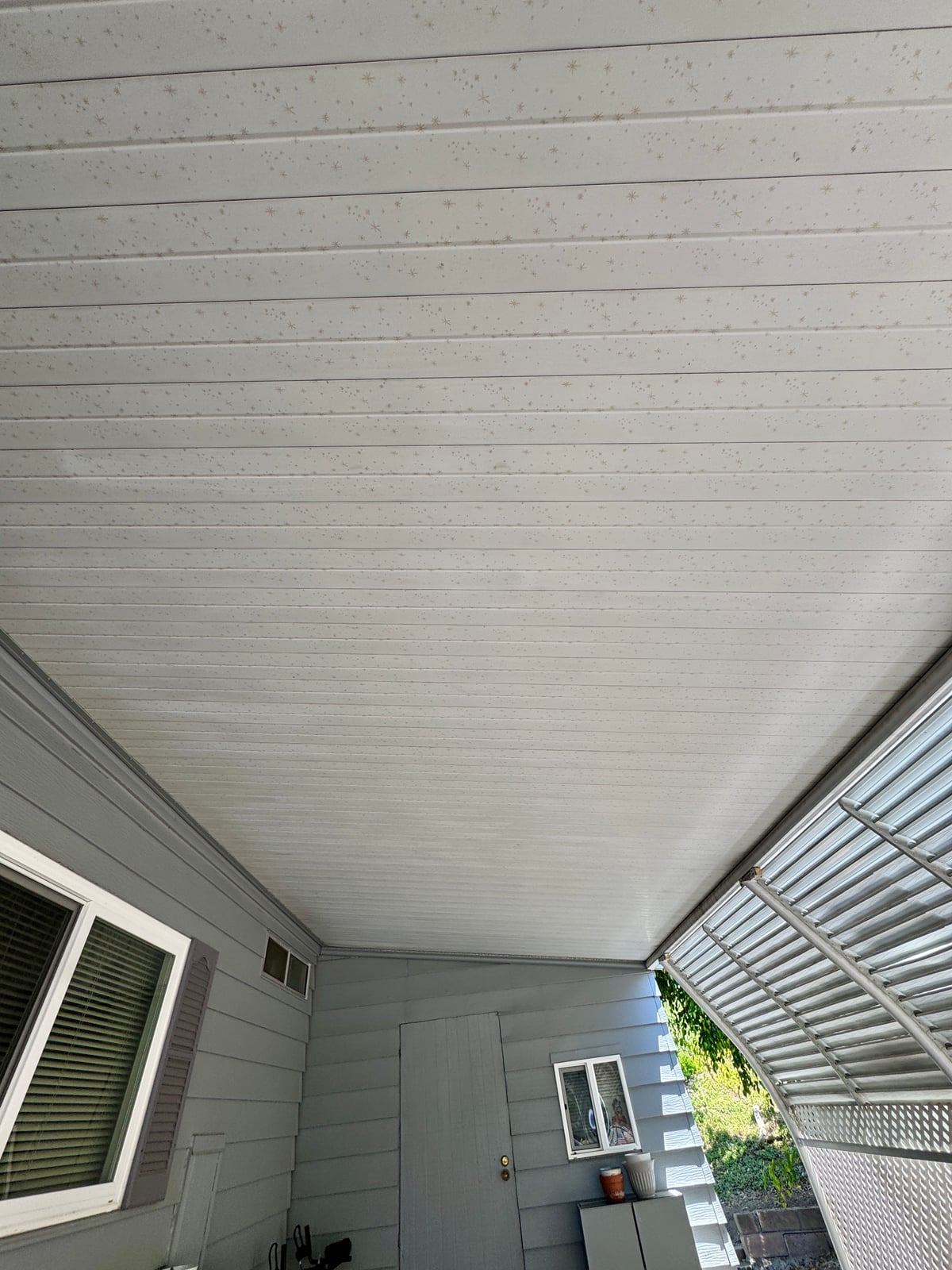 Patio cover pressure washing and exterior window cleaning
